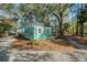 Quaint cottage with screened porch and wooded setting at 8934 Sandy Creek Rd, Edisto Island, SC 29438