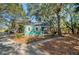 Charming seaside cottage nestled in the trees at 8934 Sandy Creek Rd, Edisto Island, SC 29438