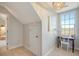 Upstairs hallway with a desk, chair, and a window overlooking the marsh at 8934 Sandy Creek Rd, Edisto Island, SC 29438