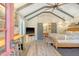 Bright bedroom with vaulted ceiling and barn doors at 8934 Sandy Creek Rd, Edisto Island, SC 29438