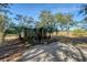 Outdoor restrooms nestled amongst lush landscaping at 8934 Sandy Creek Rd, Edisto Island, SC 29438