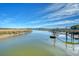 Calm waters and marsh grasses along the shoreline at 8934 Sandy Creek Rd, Edisto Island, SC 29438