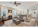 Living room with hardwood floors, comfortable seating, and open floor plan at 913 High Nest Lane Ln, Charleston, SC 29412