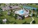Resort-style pool and tennis courts with clubhouse in background at 102 Black Stilt Way, Summerville, SC 29483