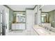 Spa-like bathroom with double vanity, granite countertops, and a walk-in shower at 102 Black Stilt Way, Summerville, SC 29483