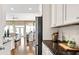 Kitchen with granite countertops, stainless steel appliances and view into the living room at 102 Black Stilt Way, Summerville, SC 29483