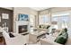 Bright living room featuring a fireplace and access to backyard at 102 Black Stilt Way, Summerville, SC 29483