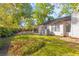 Spacious backyard with a patio and mature trees at 109 Salem Ct, Summerville, SC 29486