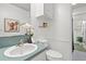 Updated bathroom with light teal vanity, white toilet and flooring at 109 Salem Ct, Summerville, SC 29486