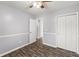 Bedroom with grey walls, wood-look flooring, and a ceiling fan at 109 Salem Ct, Summerville, SC 29486