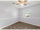 Bedroom with grey walls, wood-look flooring, and a ceiling fan at 109 Salem Ct, Summerville, SC 29486
