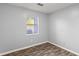 Simple bedroom with grey walls and wood-look flooring at 109 Salem Ct, Summerville, SC 29486