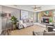 Cozy living room with stone fireplace, grey walls and comfy seating at 109 Salem Ct, Summerville, SC 29486