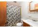 Bathroom has shower/tub combo, and wood vanity at 1134 S Shadow Dr, Mount Pleasant, SC 29464