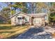 Brick ranch house with attached garage and a spacious yard at 1134 S Shadow Dr, Mount Pleasant, SC 29464