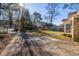 House exterior view with a driveway and small yard at 1134 S Shadow Dr, Mount Pleasant, SC 29464