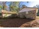 Brick house exterior with detached garage and yard at 1134 S Shadow Dr, Mount Pleasant, SC 29464