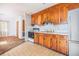Kitchen with wood cabinets, linoleum floor, and appliances at 1134 S Shadow Dr, Mount Pleasant, SC 29464