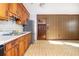 Dated kitchen features wood cabinets, and vinyl flooring at 1134 S Shadow Dr, Mount Pleasant, SC 29464
