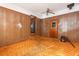 Spacious living room with wood paneling and orange carpet at 1134 S Shadow Dr, Mount Pleasant, SC 29464