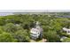 House nestled in a tree-lined neighborhood near the water at 124 Mary St, Mount Pleasant, SC 29464