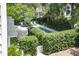 Serene pool and lush greenery surrounding the property at 124 Mary St, Mount Pleasant, SC 29464