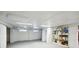 Clean and spacious basement with ample storage shelving at 124 Mary St, Mount Pleasant, SC 29464