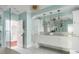 Elegant bathroom with double vanity and marble countertops at 124 Mary St, Mount Pleasant, SC 29464
