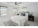 Spacious bedroom with a queen-size bed and large windows at 124 Mary St, Mount Pleasant, SC 29464