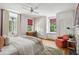 Serene bedroom with hardwood floors and built-in window seat at 124 Mary St, Mount Pleasant, SC 29464