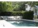 Relaxing patio area with comfortable seating near the refreshing pool at 124 Mary St, Mount Pleasant, SC 29464