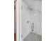 Clean shower with white subway tile and a checkered floor at 124 Mary St, Mount Pleasant, SC 29464