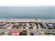 Aerial view of beachfront home and neighborhood at 1306 Palmetto Blvd, Edisto Beach, SC 29438