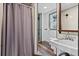 Small bathroom with shower, toilet and sink at 1306 Palmetto Blvd, Edisto Beach, SC 29438