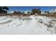 Footprints in the snow leading to a beach house at 1306 Palmetto Blvd, Edisto Beach, SC 29438