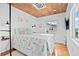 Charming bedroom with coastal decor and wood floors at 1306 Palmetto Blvd, Edisto Beach, SC 29438