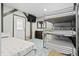 Basement bedroom with twin bed and bunk bed at 1306 Palmetto Blvd, Edisto Beach, SC 29438