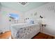 Bright bedroom with starfish bedding and ocean views at 1306 Palmetto Blvd, Edisto Beach, SC 29438