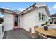Private deck with small table and chairs at 1306 Palmetto Blvd, Edisto Beach, SC 29438