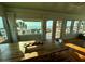 Dining room with a large window showcasing a view of the ocean at 1306 Palmetto Blvd, Edisto Beach, SC 29438
