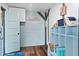 Bright entryway with built-in shelving and light blue walls at 1306 Palmetto Blvd, Edisto Beach, SC 29438