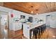 Spacious kitchen featuring white cabinets and a large kitchen island at 1306 Palmetto Blvd, Edisto Beach, SC 29438