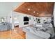 Spacious living area with sectional sofa and fireplace at 1306 Palmetto Blvd, Edisto Beach, SC 29438