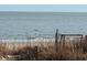 Ocean view with dolphin and beach access at 1306 Palmetto Blvd, Edisto Beach, SC 29438