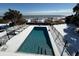 Private pool with surrounding snow, offering a unique winter view at 1306 Palmetto Blvd, Edisto Beach, SC 29438