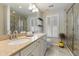 Elegant bathroom with dual vanities, a large shower, and granite countertops at 1504 Oldenburg Dr, Mount Pleasant, SC 29466