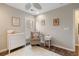 Bedroom with dresser, rocker, and neutral decor at 1504 Oldenburg Dr, Mount Pleasant, SC 29466