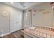 Charming bedroom with a queen-size bed, hardwood floors, and plenty of natural light at 1504 Oldenburg Dr, Mount Pleasant, SC 29466