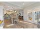 Bright dining area with hardwood floors and french doors to backyard at 1504 Oldenburg Dr, Mount Pleasant, SC 29466
