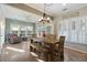Sunlit dining room with a wooden table and bench seating at 1504 Oldenburg Dr, Mount Pleasant, SC 29466